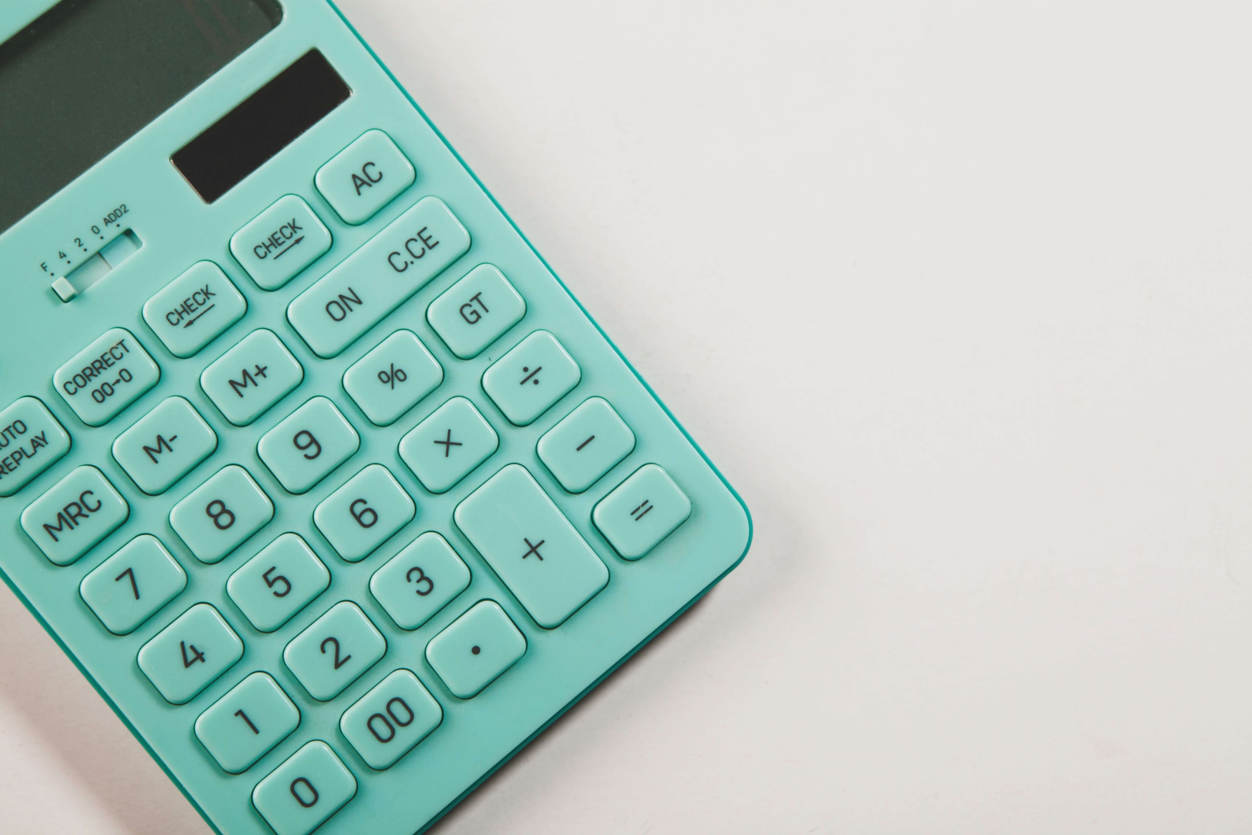 teal calculator on white background